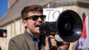 Nick Fuentes with bullhorn at a Stop The Steal rally